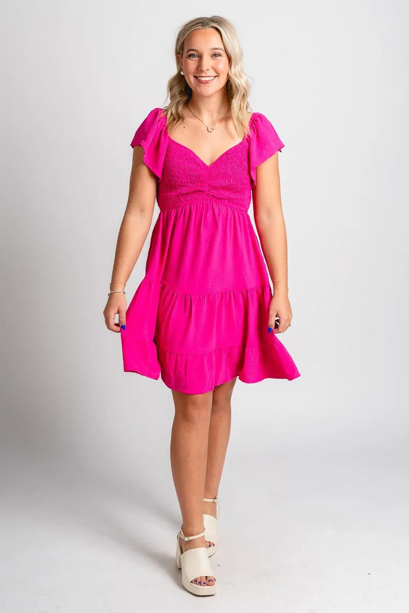 Smocked flutter sleeve dress hot pink
