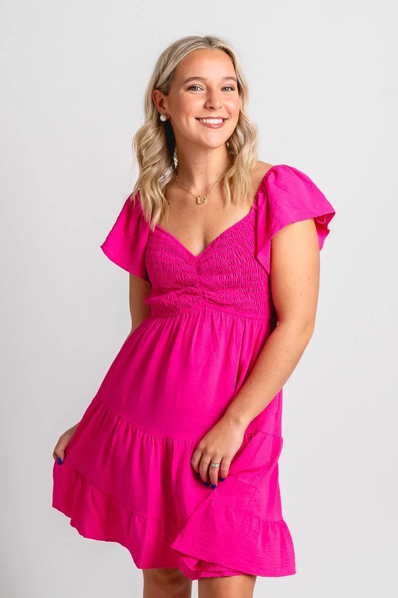 Smocked flutter sleeve dress hot pink